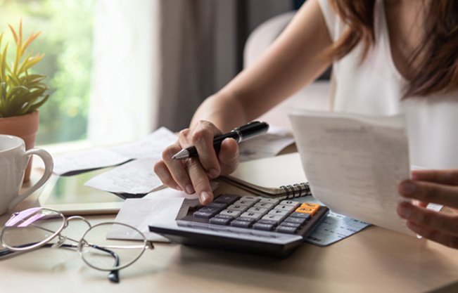 Patient in Covington budgeting for cosmetic dentistry